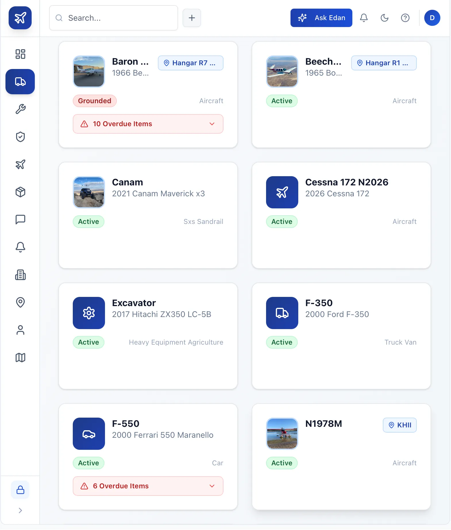 High Maintenance fleet overview showing vehicle cards for two Beechcraft aircraft, a Cessna 172, a Canam side-by-side, a Hitachi excavator, a Ford F-350, a Ferrari 550, and a seaplane — each with an Active or Grounded status badge and overdue item counts